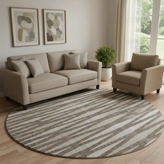 8' Brown And Ivory Geometric Washable Round Rug With UV Protection Photo 1