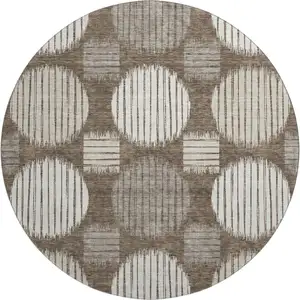 Photo of 8' Brown And Ivory Geometric Washable Round Rug With UV Protection
