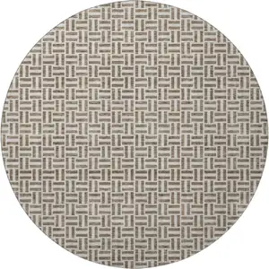 Photo of 8' Brown And Ivory Geometric Washable Round Rug With UV Protection