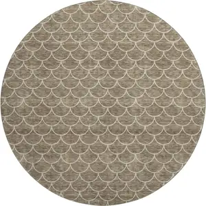 Photo of 8' Brown And Ivory Geometric Washable Round Rug With UV Protection