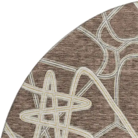 8' Brown And Ivory Geometric Washable Round Rug With UV Protection Photo 2