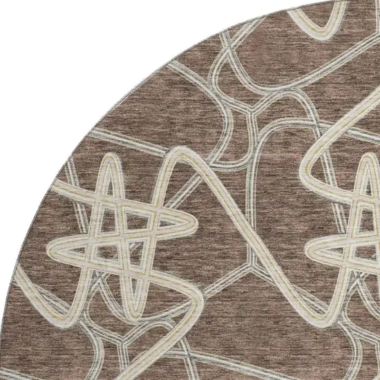 8' Brown And Ivory Geometric Washable Round Rug With UV Protection Photo 3