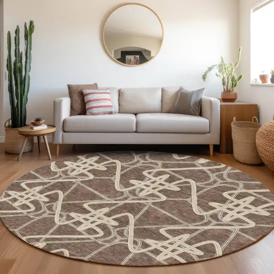 8' Brown And Ivory Geometric Washable Round Rug With UV Protection Photo 4