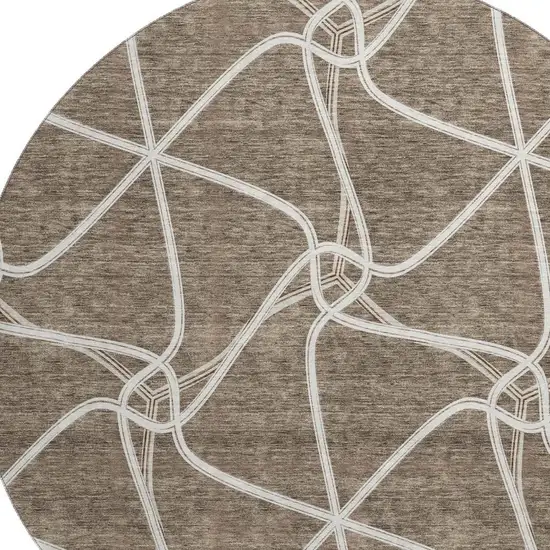 8' Brown And Ivory Geometric Washable Round Rug With UV Protection Photo 2