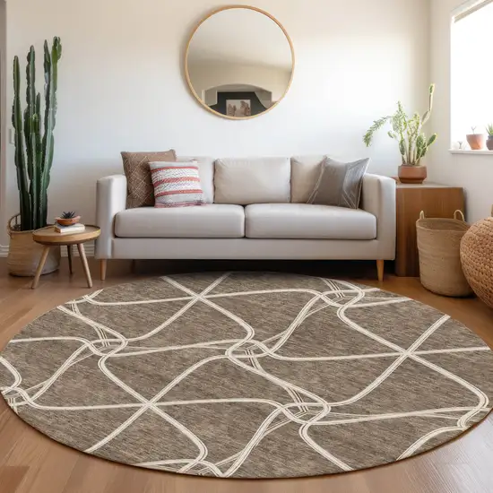 8' Brown And Ivory Geometric Washable Round Rug With UV Protection Photo 4