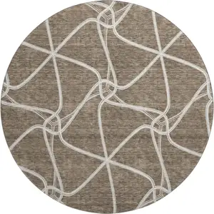 Photo of 8' Brown And Ivory Geometric Washable Round Rug With UV Protection