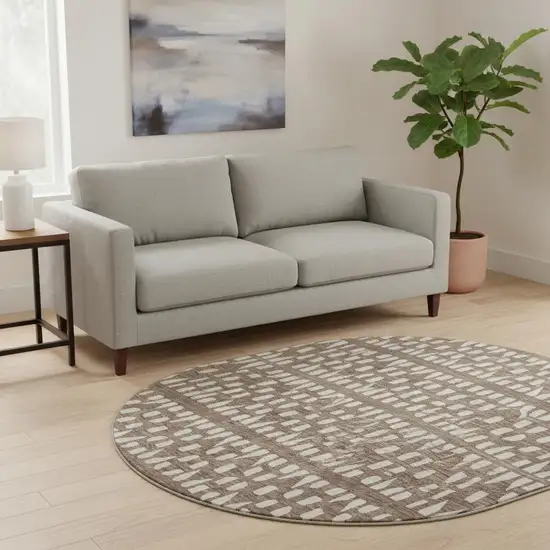 8' Brown And Ivory Geometric Washable Round Rug With UV Protection Photo 2