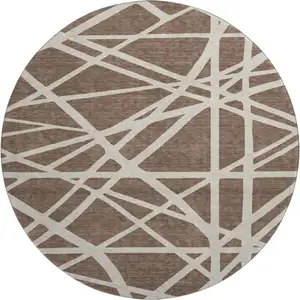 Photo of 8' Brown And Ivory Geometric Washable Round Rug With UV Protection