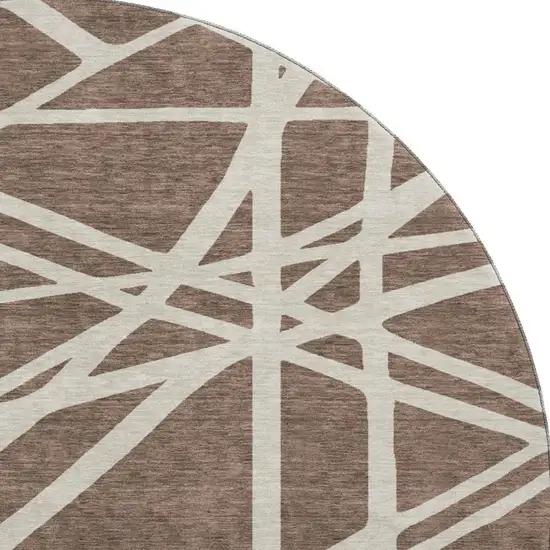 8' Brown And Ivory Geometric Washable Round Rug With UV Protection Photo 2