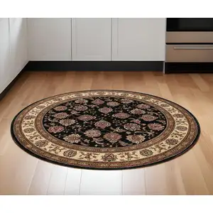 Photo of 6' Brown And Ivory Oriental Round Rug