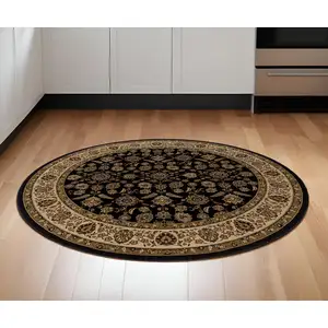 Photo of 6' Brown And Ivory Oriental Round Rug