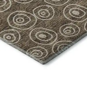 Photo of 8' Brown And Ivory Polka Dot Washable Round Rug With UV Protection