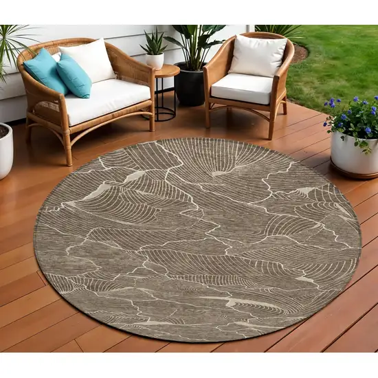 8' Brown And Ivory Round Abstract Washable Indoor Outdoor Area Rug Photo 1