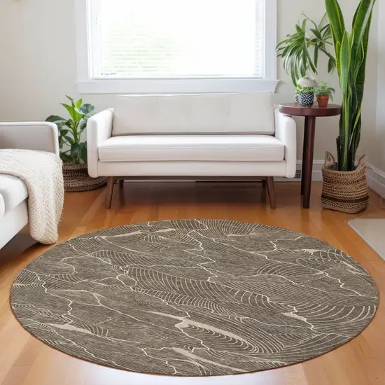 8' Brown And Ivory Round Abstract Washable Indoor Outdoor Area Rug Photo 8