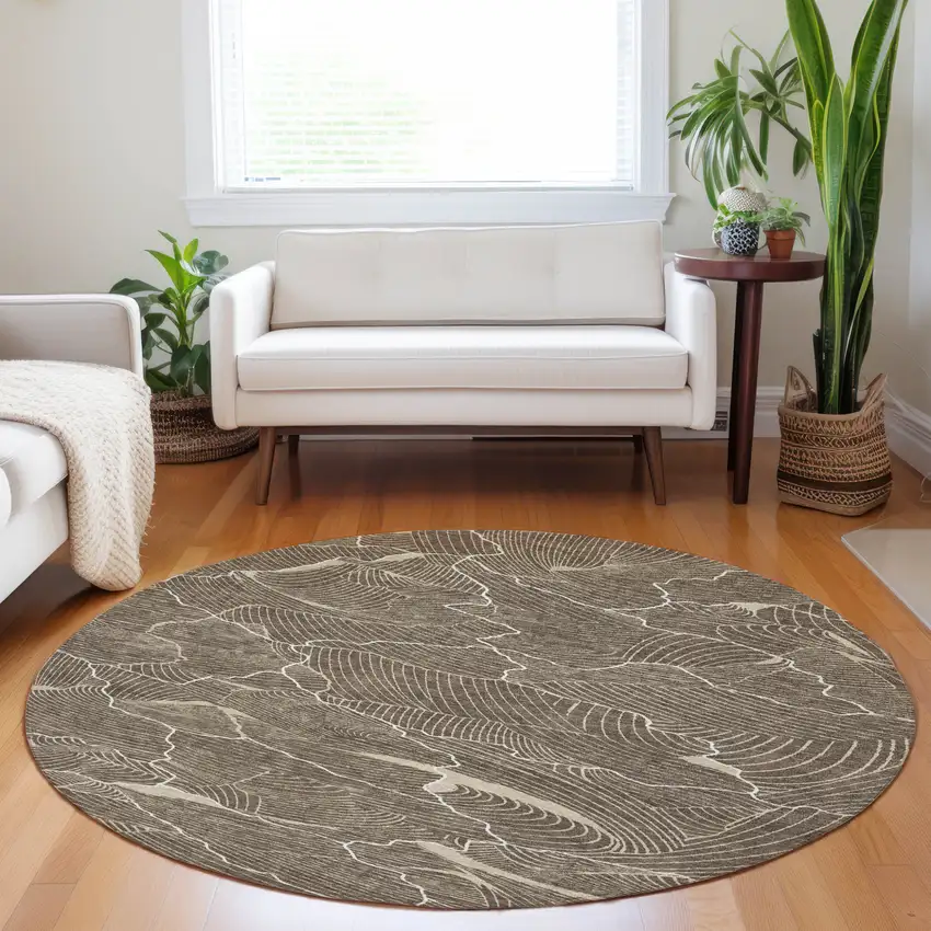 8' Brown And Ivory Round Abstract Washable Indoor Outdoor Area Rug Photo 8
