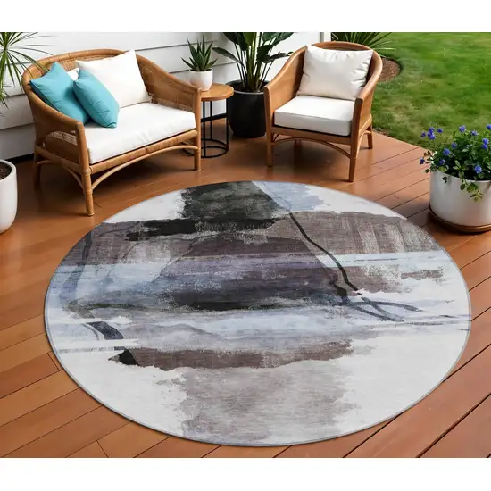 8' Brown And Ivory Round Abstract Washable Indoor Outdoor Area Rug Photo 2
