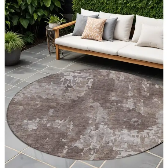 8' Brown And Ivory Round Abstract Washable Indoor Outdoor Area Rug Photo 1