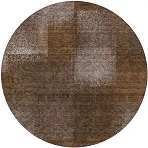 Photo of 8' Brown And Ivory Round Abstract Washable Indoor Outdoor Area Rug