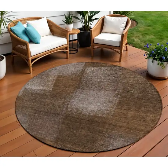 8' Brown And Ivory Round Abstract Washable Indoor Outdoor Area Rug Photo 1