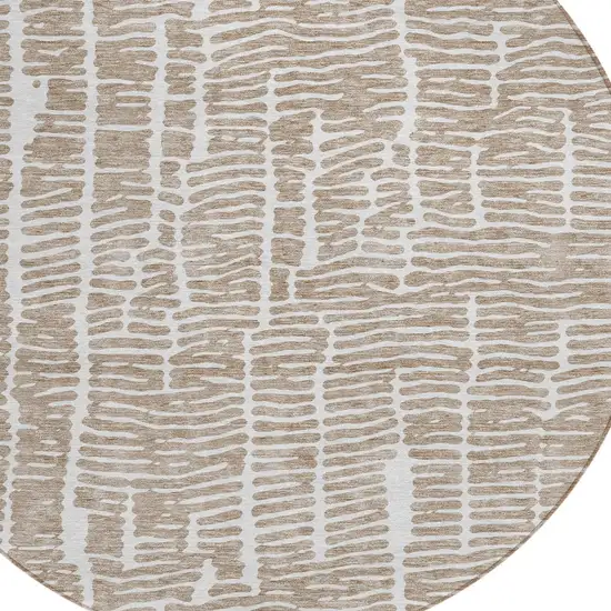 8' Brown And Ivory Round Abstract Washable Indoor Outdoor Area Rug Photo 4