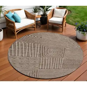 Photo of 8' Brown And Ivory Round Geometric Washable Indoor Outdoor Area Rug
