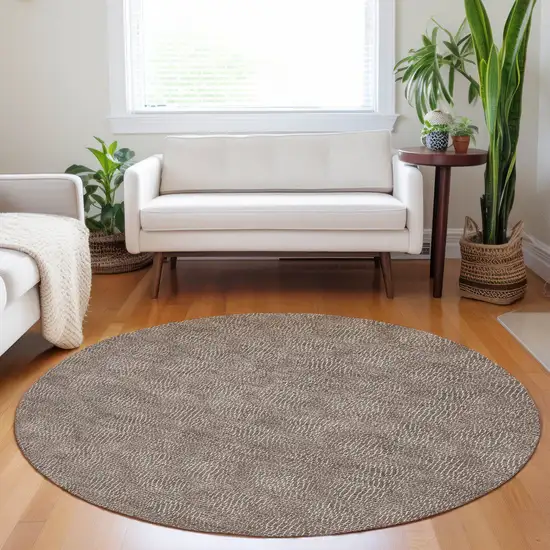 8' Brown And Ivory Round Geometric Washable Indoor Outdoor Area Rug Photo 8