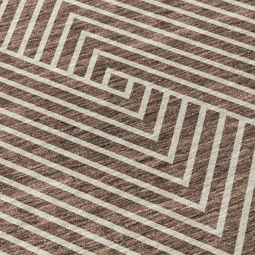 8' Brown And Ivory Round Geometric Washable Indoor Outdoor Area Rug Photo 4