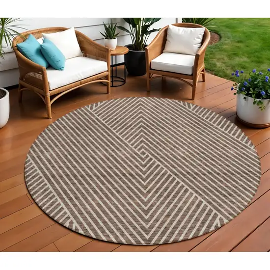 8' Brown And Ivory Round Geometric Washable Indoor Outdoor Area Rug Photo 1