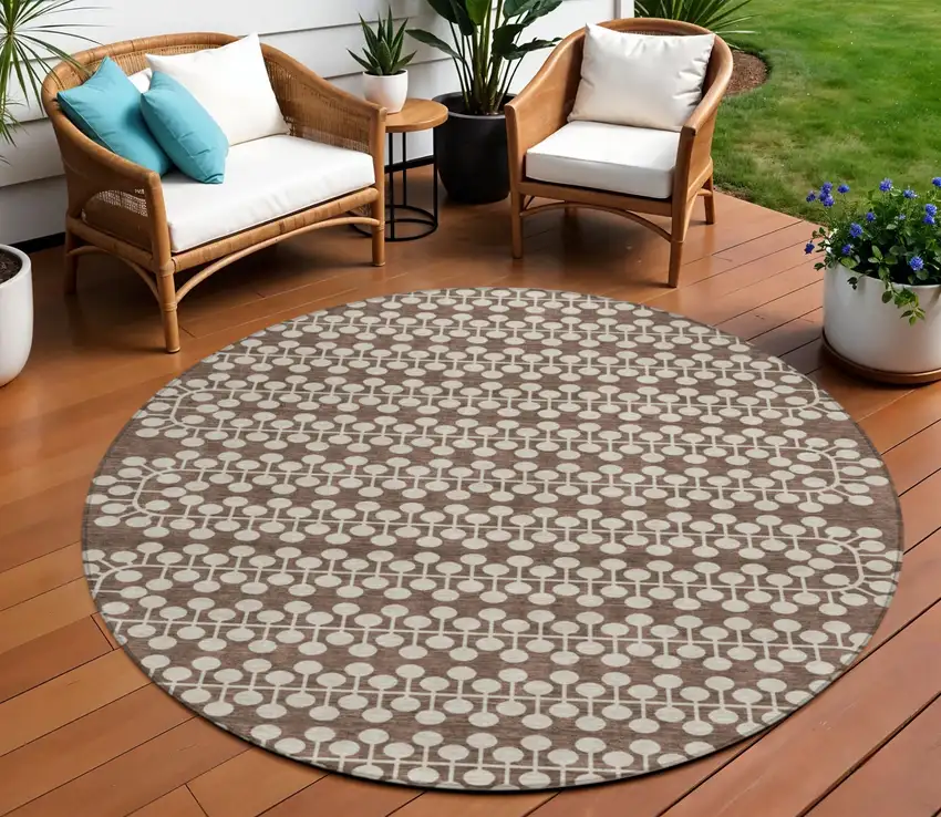 8' Brown And Ivory Round Geometric Washable Indoor Outdoor Area Rug Photo 1