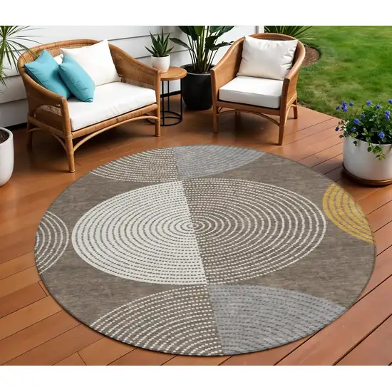 8' Brown And Ivory Round Geometric Washable Indoor Outdoor Area Rug Photo 1