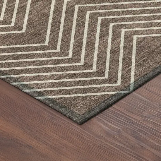 8' Brown And Ivory Round Geometric Washable Indoor Outdoor Area Rug Photo 8