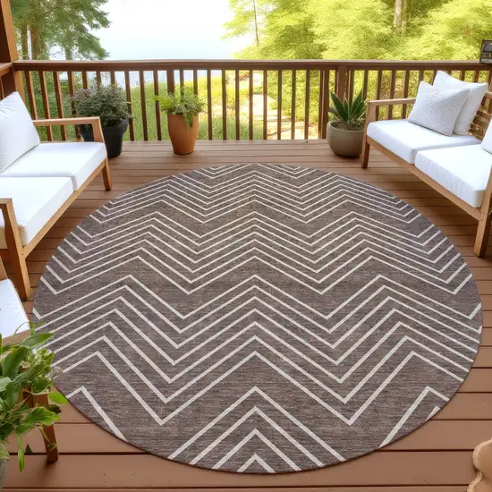 8' Brown And Ivory Round Geometric Washable Indoor Outdoor Area Rug Photo 4