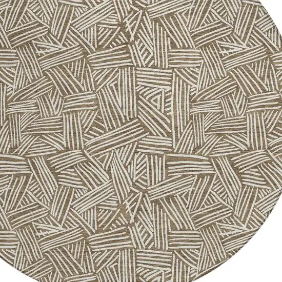 8' Brown And Ivory Round Geometric Washable Indoor Outdoor Area Rug Photo 5