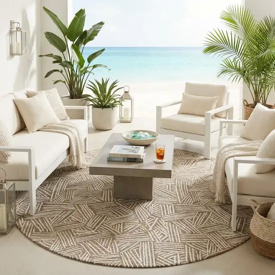 8' Brown And Ivory Round Geometric Washable Indoor Outdoor Area Rug Photo 1