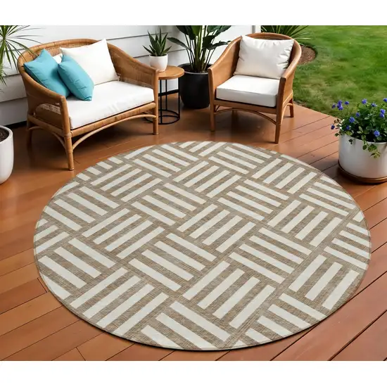 8' Brown And Ivory Round Geometric Washable Indoor Outdoor Area Rug Photo 1