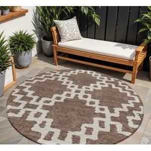 Photo of 8' Brown And Ivory Round Geometric Washable Indoor Outdoor Area Rug