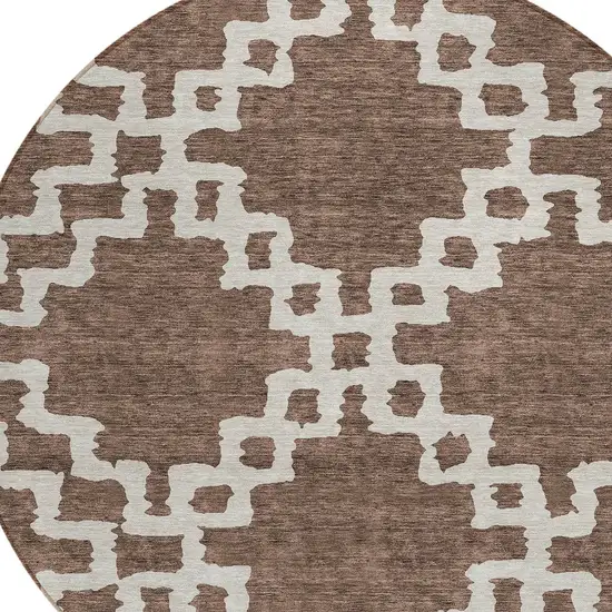8' Brown And Ivory Round Geometric Washable Indoor Outdoor Area Rug Photo 4