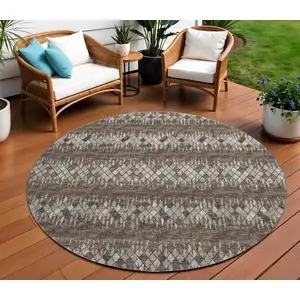 Photo of 8' Brown And Ivory Round Ikat Washable Indoor Outdoor Area Rug