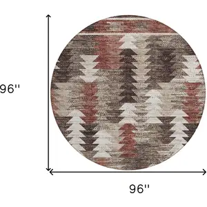 Photo of 8' Brown And Ivory Round Southwestern Washable Indoor Outdoor Area Rug