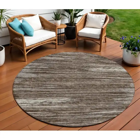 8' Brown And Ivory Round Striped Washable Indoor Outdoor Area Rug Photo 1