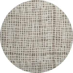 Photo of 8' Brown And Ivory Striped Washable Round Rug With UV Protection