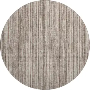 Photo of 8' Brown And Ivory Striped Washable Round Rug With UV Protection