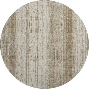 Photo of 8' Brown And Ivory Striped Washable Round Rug With UV Protection