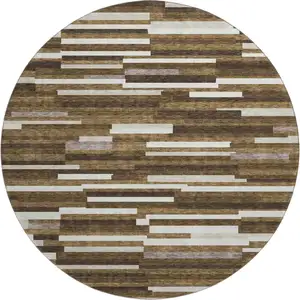 Photo of 8' Brown And Ivory Striped Washable Round Rug With UV Protection