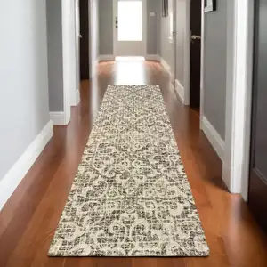 Photo of 8' Brown And Ivory Wool Floral Hand Tufted Runner Rug