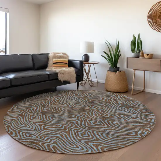 8' Brown And Light Blue Round Abstract Washable Indoor Outdoor Area Rug Photo 7