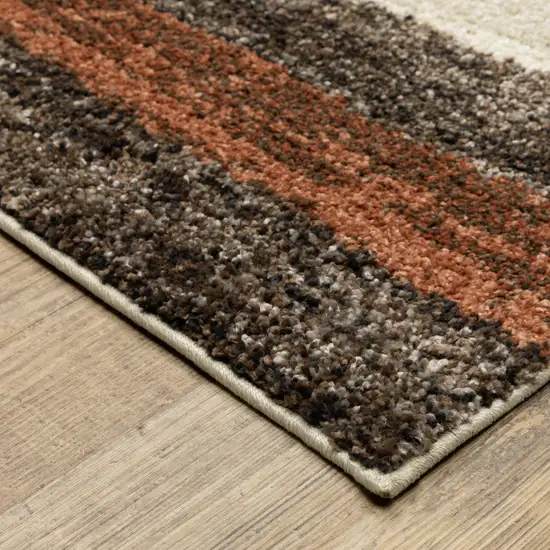 7' Brown And Rust Geometric Runner Rug Photo 6