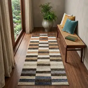 Photo of 7' Brown And Rust Geometric Runner Rug