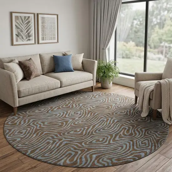 8' Brown And Sky Blue Abstract Washable Round Rug With UV Protection Photo 1