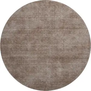 Photo of 8' Brown And Taupe Abstract Washable Round Rug With UV Protection